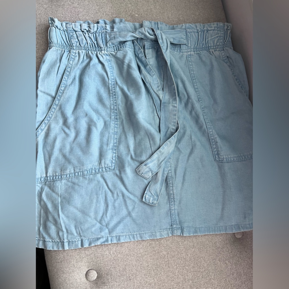 Light denim paper bag skirt. Very cute. Size 12. Really soft. Runs small.